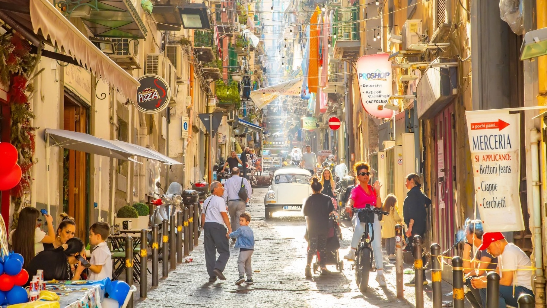 Vibrant summer street of Naples